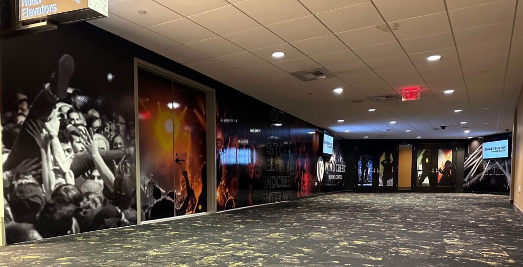 Architectural graphics installed at the VIP lounge at the Wind Creek Event Center.