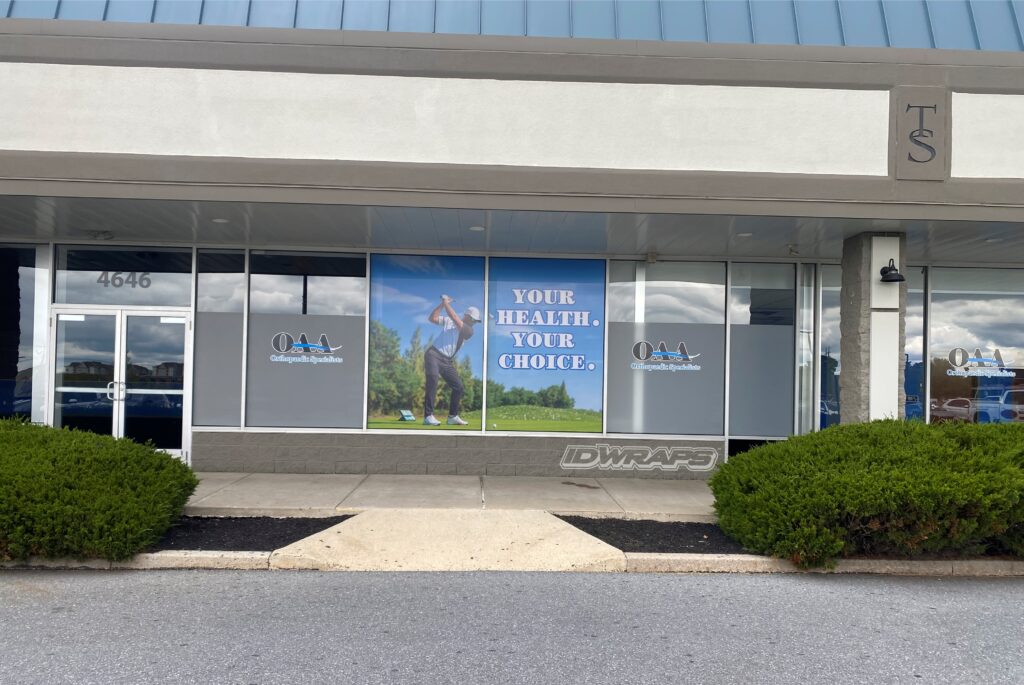 OAA utilized a blend of frosted, perforated, and cut vinyl window graphics for their new location. 
